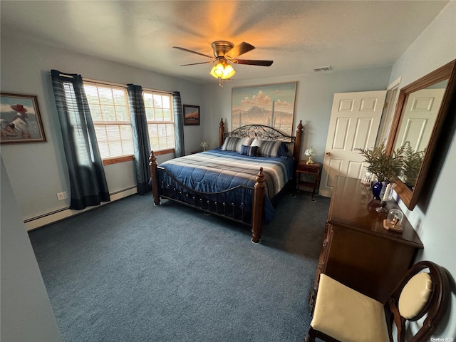 carpeted bedroom with a baseboard heating unit and ceiling fan