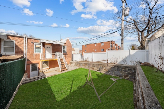 view of yard featuring a fenced backyard