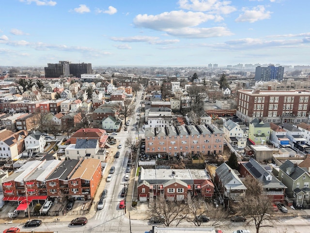 birds eye view of property with a view of city