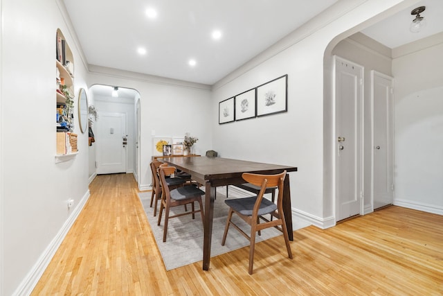 dining space featuring hardwood / wood-style flooring