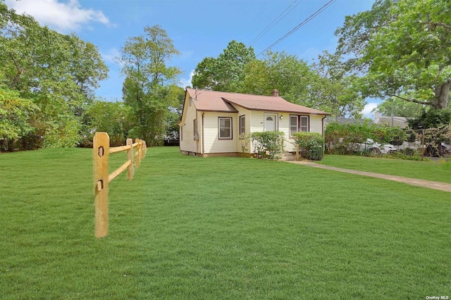 view of front of house with a front yard