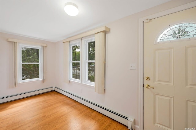 foyer entrance with light wood-type flooring