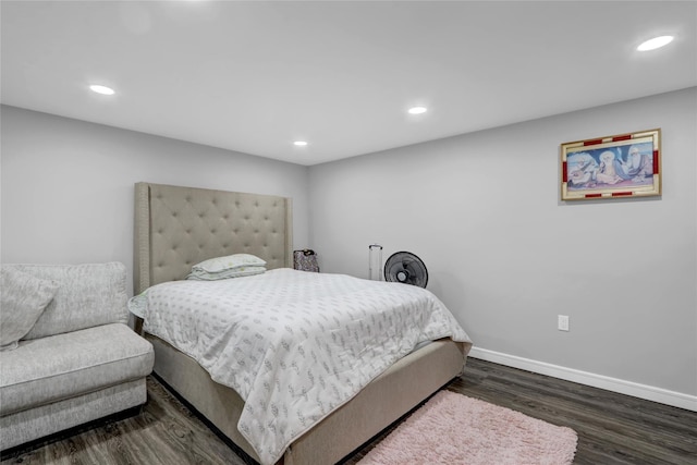 bedroom featuring dark hardwood / wood-style floors