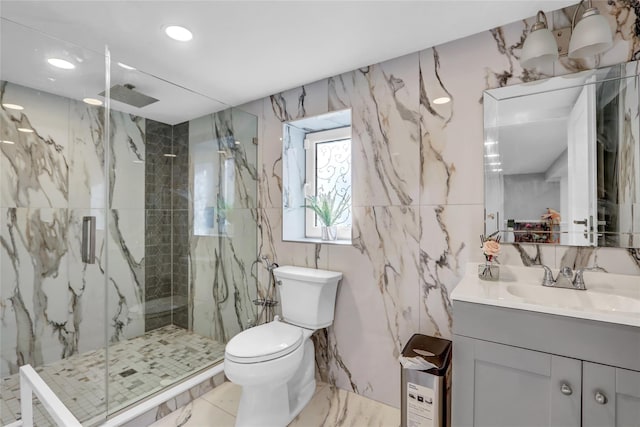 bathroom featuring vanity, tile walls, an enclosed shower, and toilet