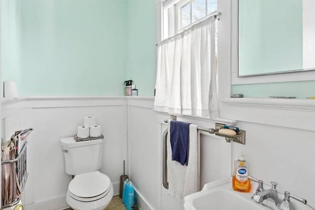 bathroom with sink and toilet