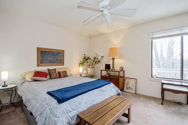 bedroom featuring carpet flooring, ceiling fan, and baseboards