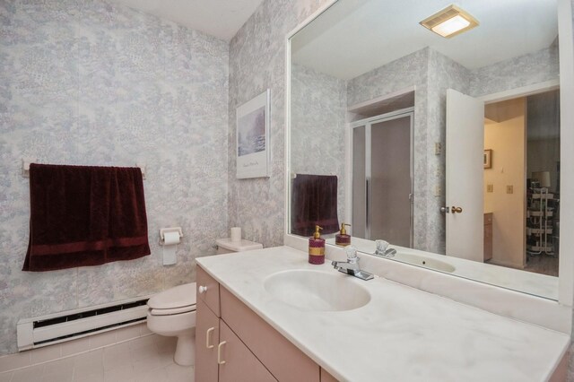 full bathroom with wallpapered walls, a baseboard heating unit, and vanity