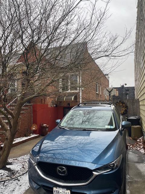 view of snow covered parking