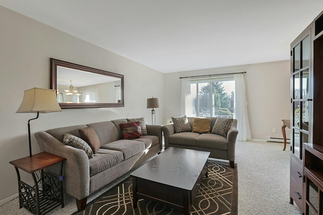 carpeted living area with a baseboard heating unit, baseboards, and a chandelier