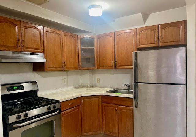 kitchen with appliances with stainless steel finishes and sink