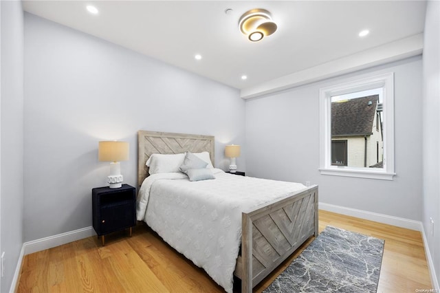 bedroom featuring hardwood / wood-style flooring