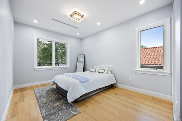 bedroom featuring hardwood / wood-style flooring