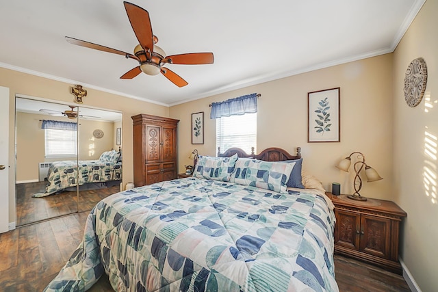 bedroom with multiple windows, dark wood-type flooring, and ornamental molding