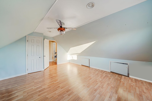 bonus room featuring light hardwood / wood-style flooring, ceiling fan, and vaulted ceiling