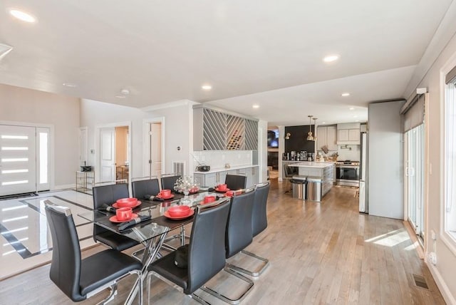 dining room featuring light hardwood / wood-style floors