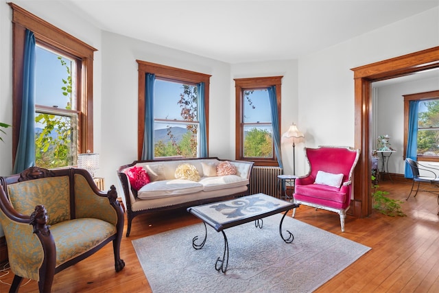 interior space featuring hardwood / wood-style flooring and radiator