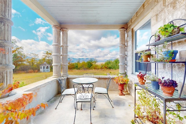 view of patio featuring an outdoor structure