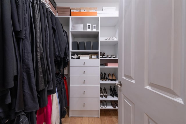 walk in closet featuring light wood-type flooring