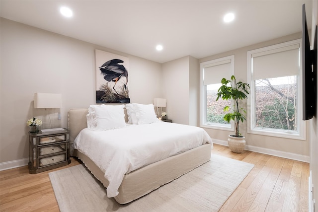 bedroom with light wood-type flooring