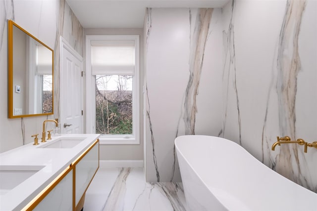 bathroom with a bathing tub and vanity