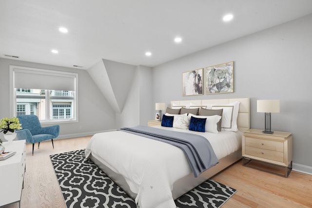 bedroom with light hardwood / wood-style flooring