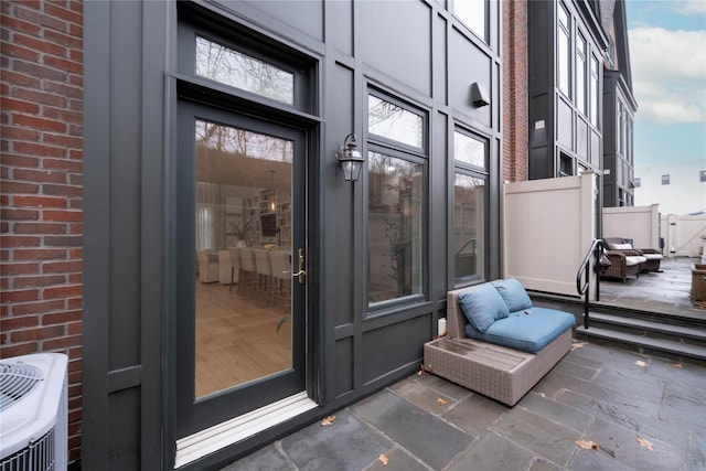 doorway to property with a patio area