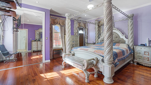 bedroom with baseboards, ornamental molding, access to outside, and wood finished floors