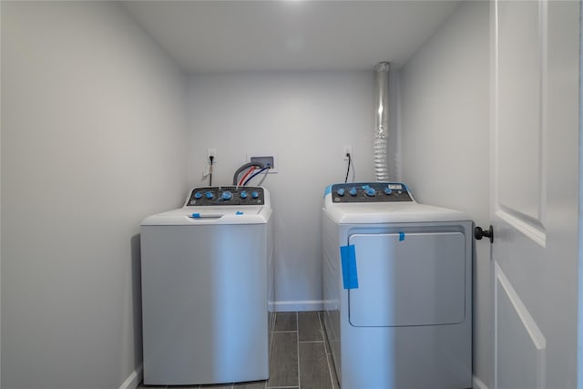 washroom with washer and dryer