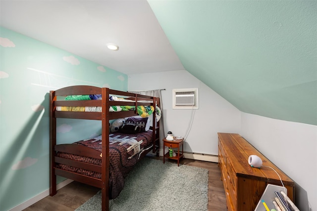 bedroom with lofted ceiling, a wall mounted air conditioner, dark wood-type flooring, and baseboard heating