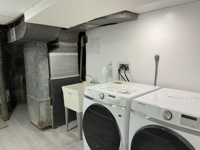 laundry area featuring washer and clothes dryer