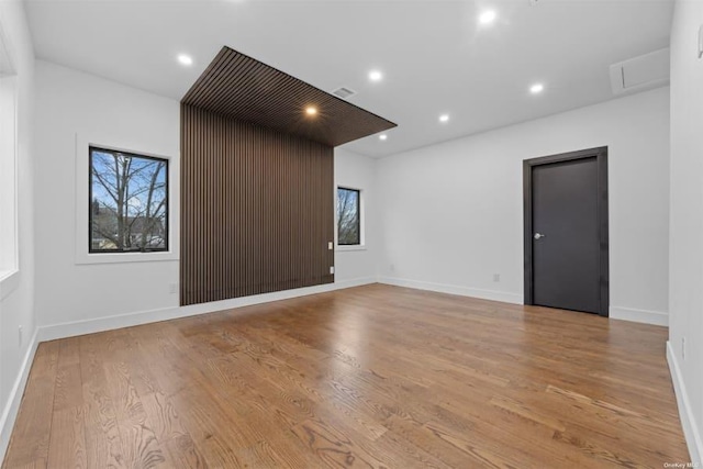 spare room with light hardwood / wood-style floors