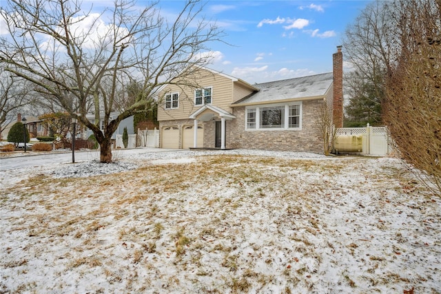 front of property with a garage