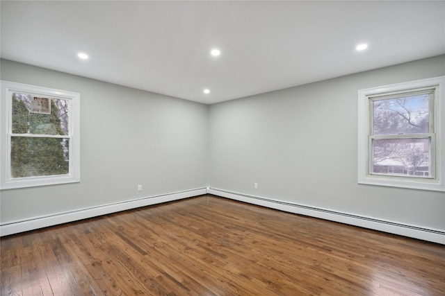 empty room featuring hardwood / wood-style flooring