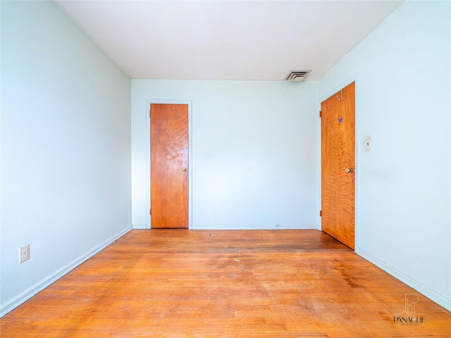 empty room featuring light hardwood / wood-style flooring