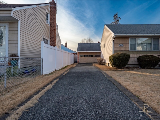 view of property exterior at dusk