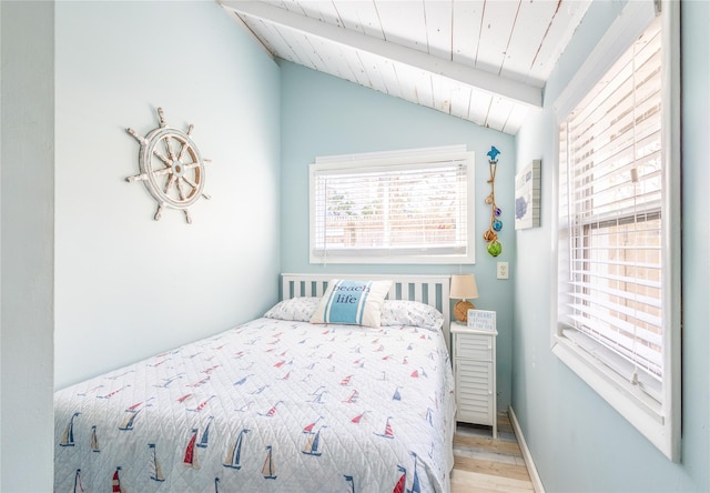 47 Woodcliff Trl, Baiting Hollow, NY 11933 - bedroom with vaulted ceiling, wood ceiling, and light hardwood / wood-style floors