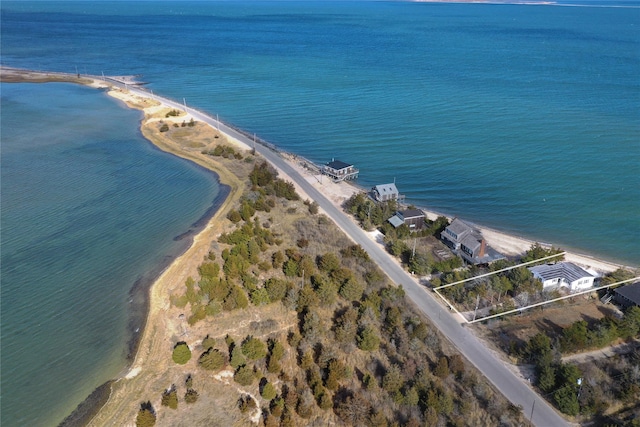 birds eye view of property featuring a water view and a view of the beach