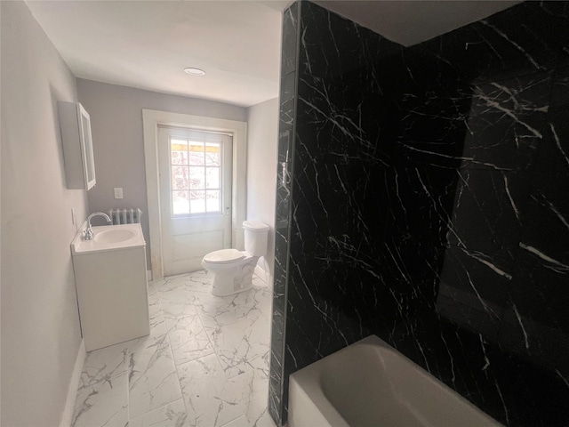 bathroom featuring baseboards, toilet, radiator heating unit, marble finish floor, and vanity