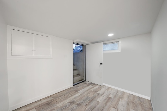 unfurnished room with light hardwood / wood-style floors