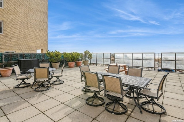 view of patio featuring outdoor dining area