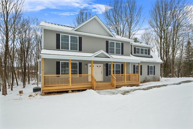 view of front facade featuring cooling unit and covered porch