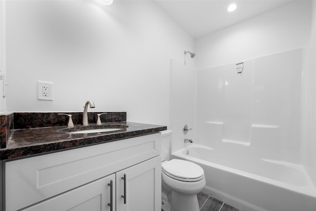 full bathroom with vanity, toilet, and tub / shower combination