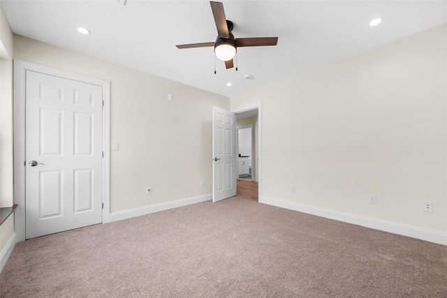 unfurnished bedroom featuring carpet flooring and ceiling fan