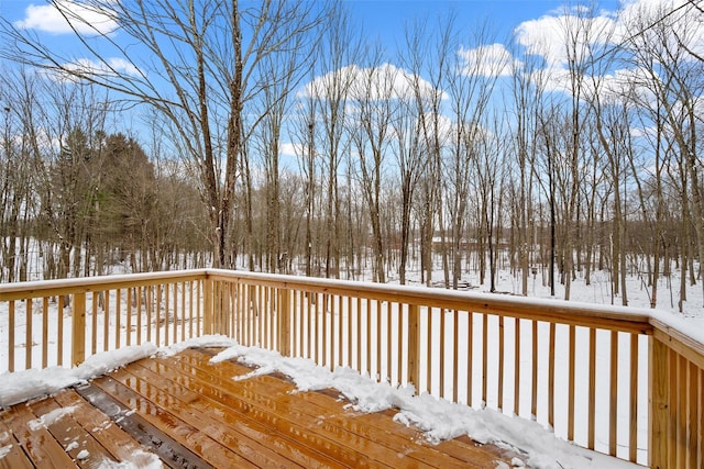 view of snow covered deck