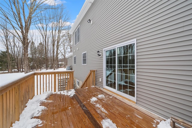 view of snow covered deck