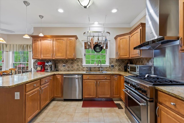 6 W Causeway, Cortlandt Manor, NY 10567 - kitchen featuring wall chimney range hood, appliances with stainless steel finishes, a sink, a peninsula, and a toaster