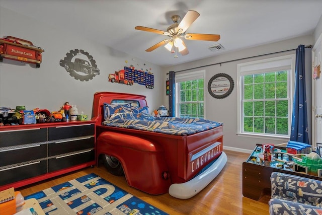 6 W Causeway, Cortlandt Manor, NY 10567 - bedroom featuring baseboards, ceiling fan, visible vents, and wood finished floors