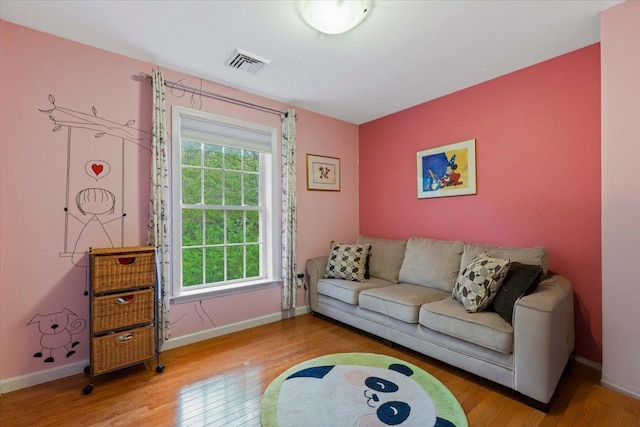 6 W Causeway, Cortlandt Manor, NY 10567 - living area with visible vents, wood finished floors, and a wealth of natural light