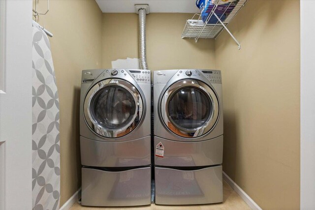 6 W Causeway, Cortlandt Manor, NY 10567 - washroom featuring washer and dryer, laundry area, and baseboards
