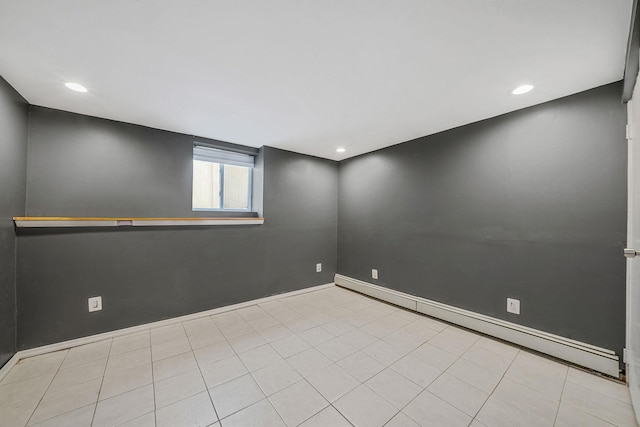 unfurnished room featuring a baseboard radiator